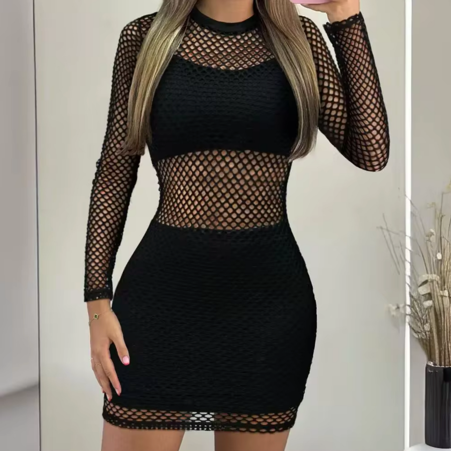 Britney – Figure-Hugging Mesh Mini Dress